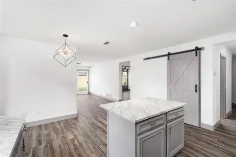 a view of kitchen and sink