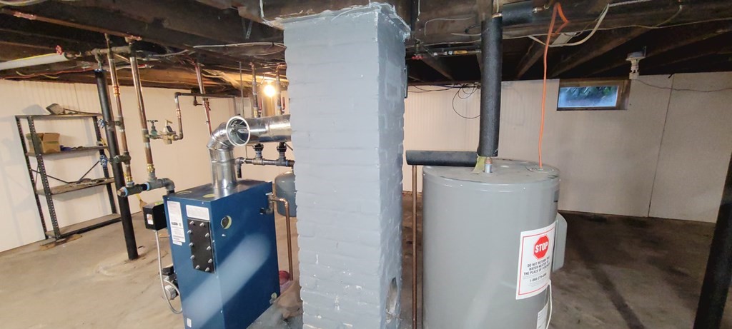 91 Rimmon Avenue Chicopee, MA 01013 - Photo 17 of 18 a utility room with dryer and washer