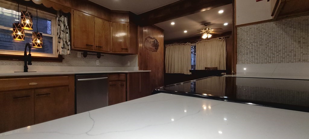 91 Rimmon Avenue Chicopee, MA 01013 - Photo 3 of 18 a kitchen with stainless steel appliances a sink stove and cabinets