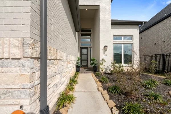 a view of a house with a porch