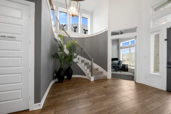 a view of a living room and hallway