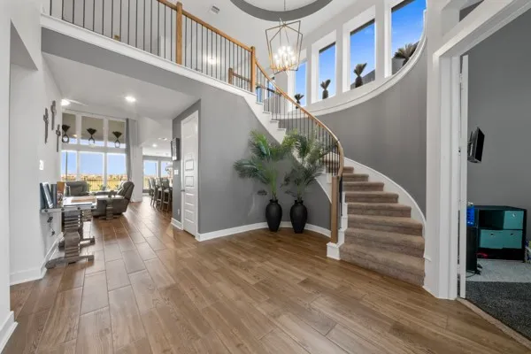 a view of entryway and livingroom with wooden floor