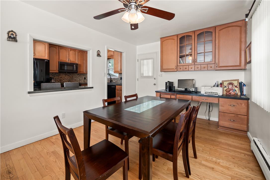 2439 Congress Street Allentown, PA 18104 - Photo 7 of 34 a view of a dining room with furniture and wooden floor