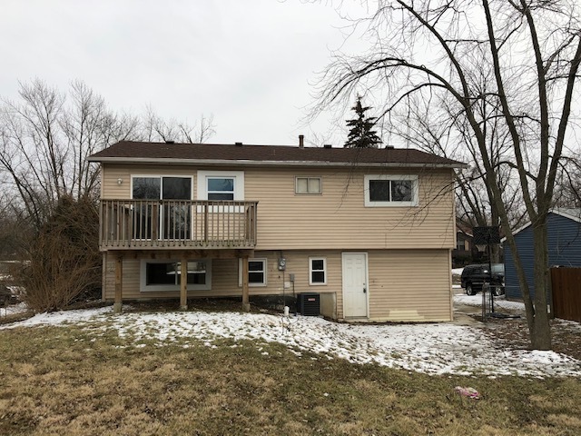 328 Hadleigh Road Bolingbrook, IL 60440 - Photo 14 of 14 a front view of a house with a yard