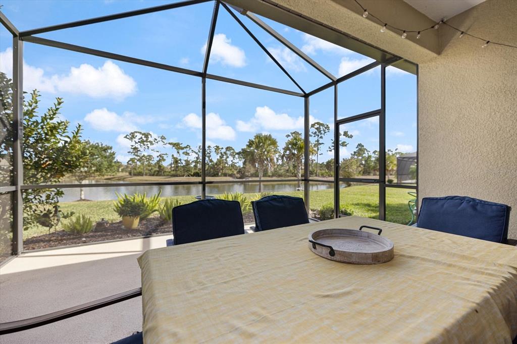 208 Brienza Loop Nokomis, FL 34275 - Photo 23 of 45 a view of a couches and table in the balcony