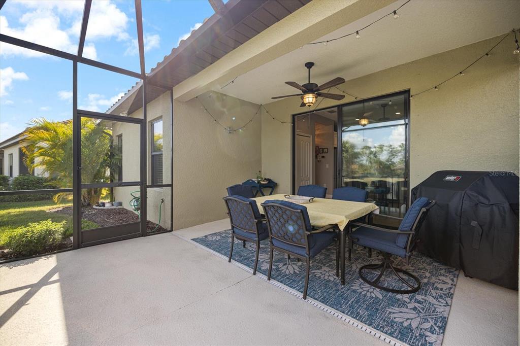 208 Brienza Loop Nokomis, FL 34275 - Photo 26 of 45 a view of a dining room with furniture window and outside view