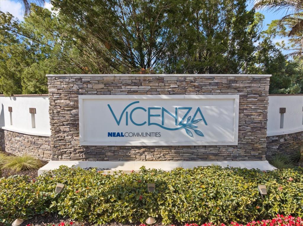 208 Brienza Loop Nokomis, FL 34275 - Photo 31 of 45 a view of outdoor space with fountain and a bench