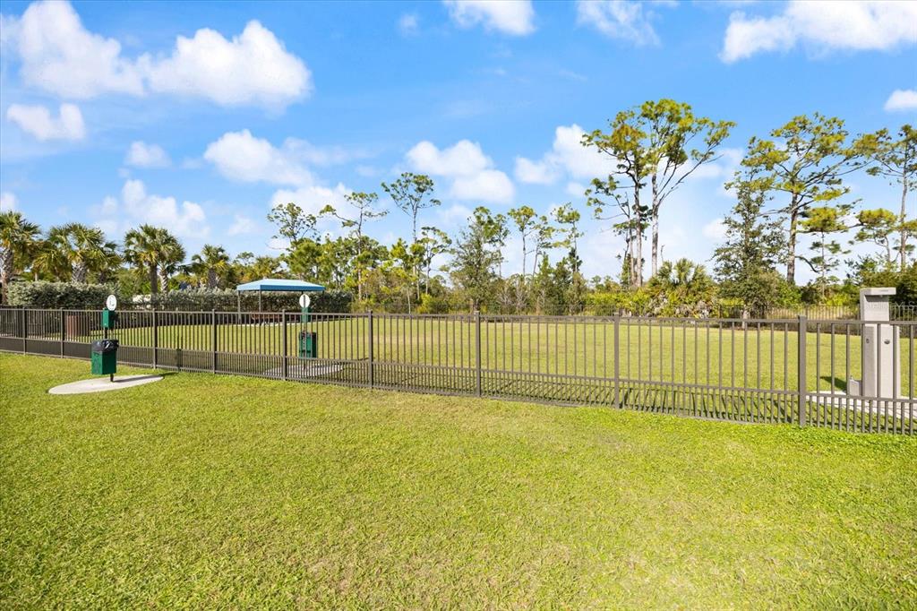 208 Brienza Loop Nokomis, FL 34275 - Photo 39 of 45 a view of a garden