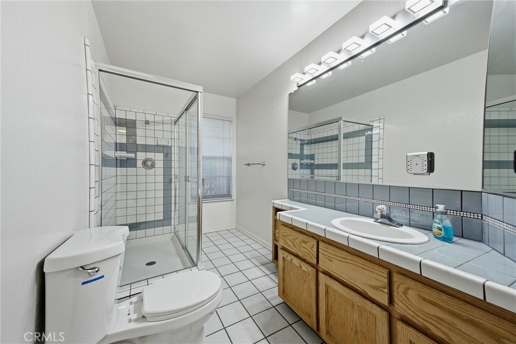 17153 Squirrel Hill Road Hidden Valley Lake, CA 95467 - Photo 25 of 34 Hall bathroom with stall shower