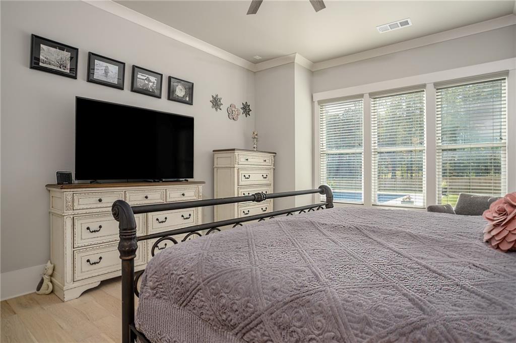 255 Old Town Road Dacula, GA 30019 - Photo 26 of 38 a living room with flat screen tv and a window