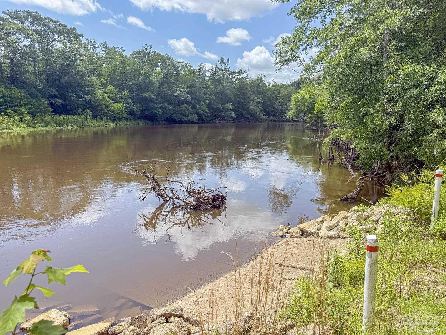 4020 Easy Street Holt, FL 32564 - Photo 14 of 19 a view of a lake with a outdoor space