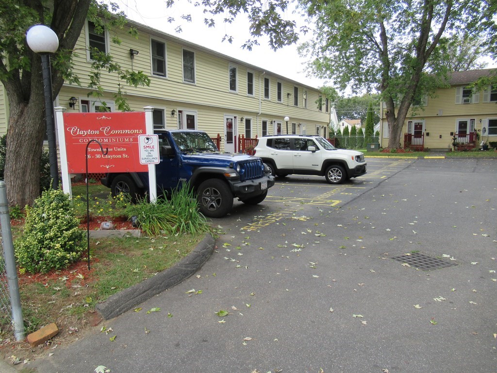 a view of a street with cars