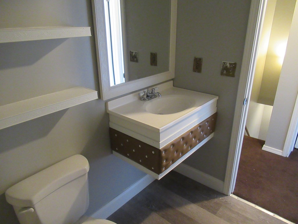 30 Clayton Street, Unit E Springfield, MA 01107 - Photo 14 of 27 a bathroom with a sink and a bathtub