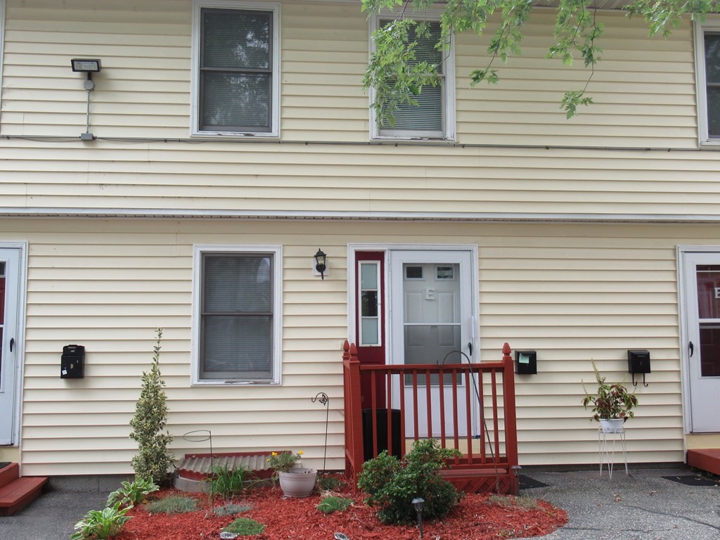 30 Clayton Street, Unit E Springfield, MA 01107 - Photo 3 of 27 a view of a house with a small garden