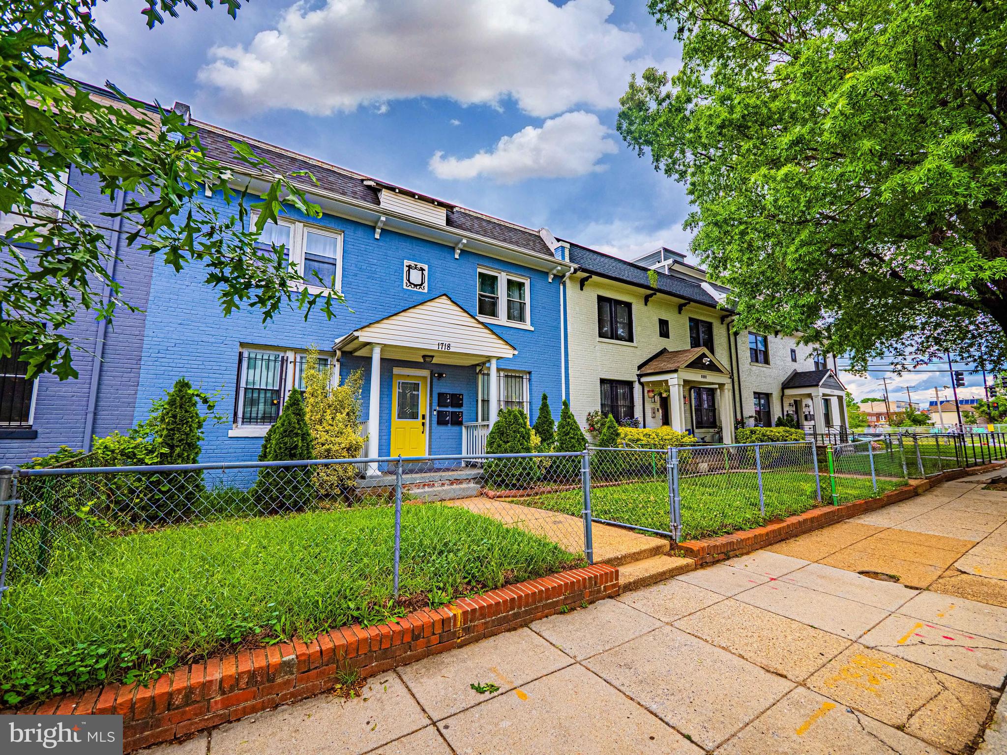 1718 West Virginia Avenue Northeast, Unit 1 Washington, DC 20002 - Photo 2 of 12 a front view of a house with a yard