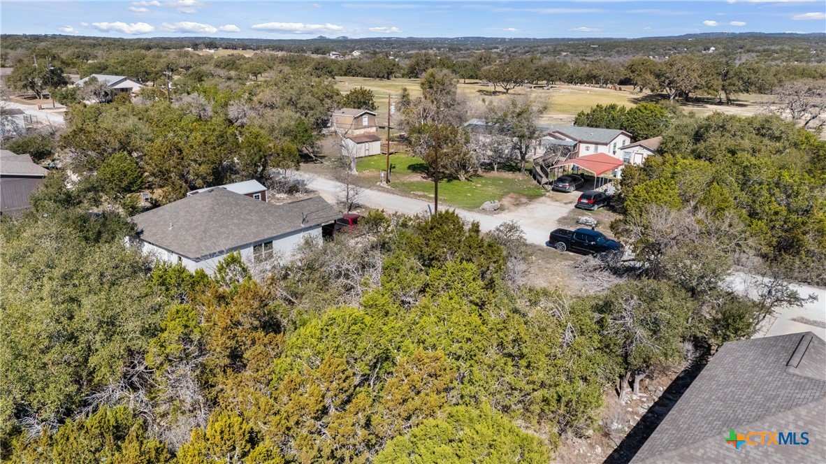 1738 Cave Drive Spring Branch, TX 78070 - Photo 14 of 18 an aerial view of residential house with outdoor space
