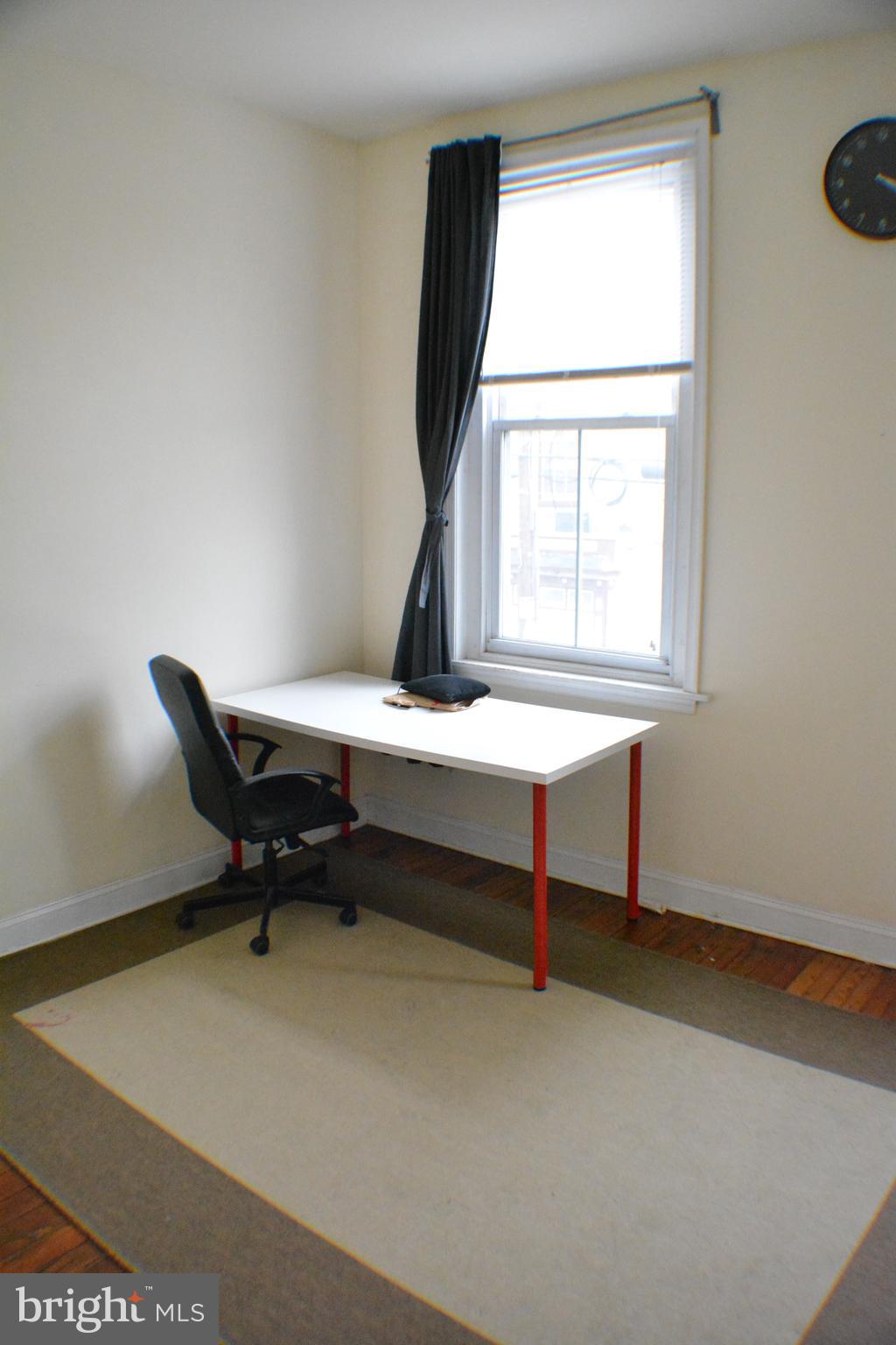 4217 Ridge Avenue, Unit 2 Philadelphia, PA 19129 - Photo 11 of 11 a reading room with furniture and a window