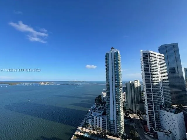 a view of city with ocean view