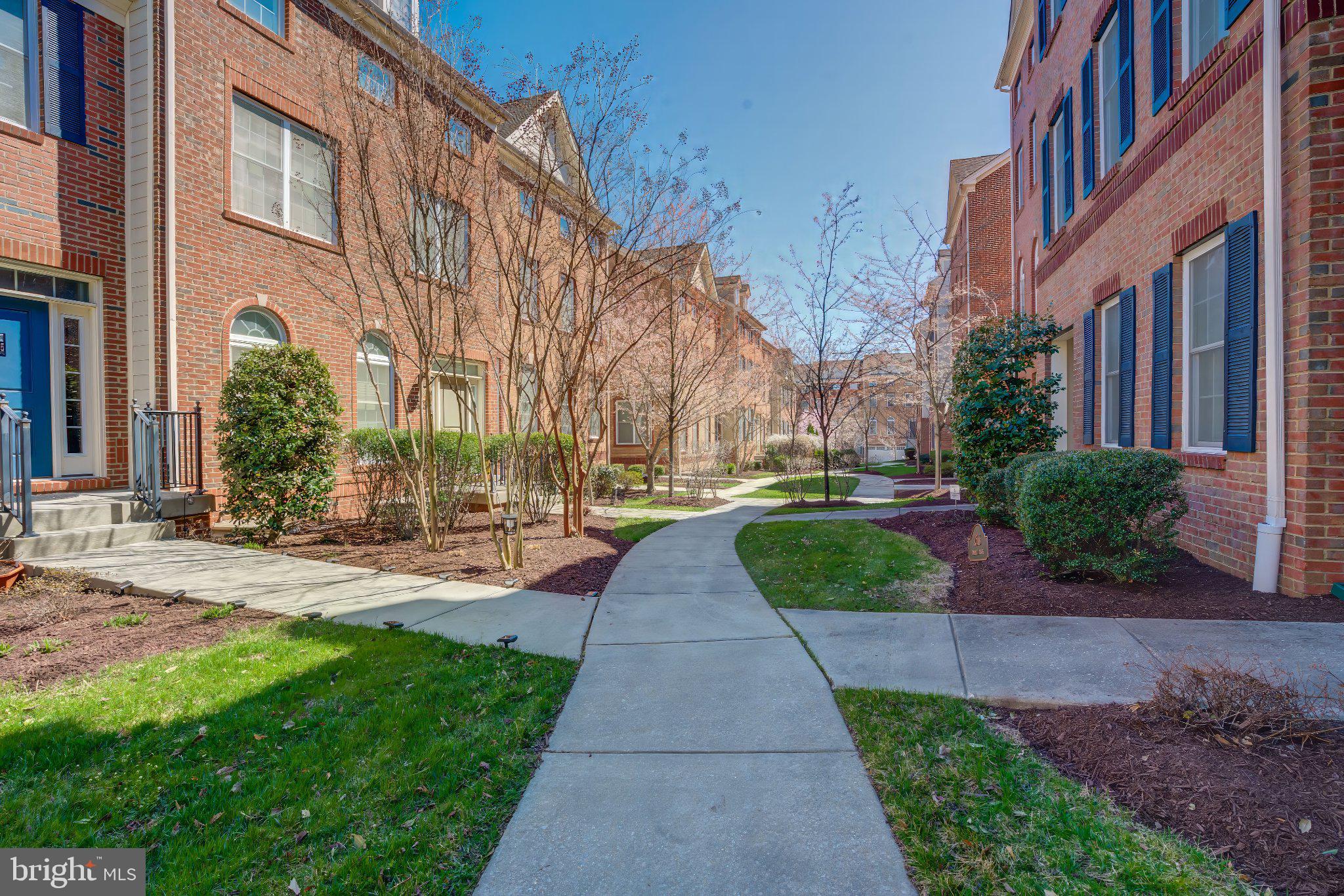 2517 Cherry Tree Road Hanover, MD 21076 - Photo 2 of 61 Charming pathway through brick townhomes.