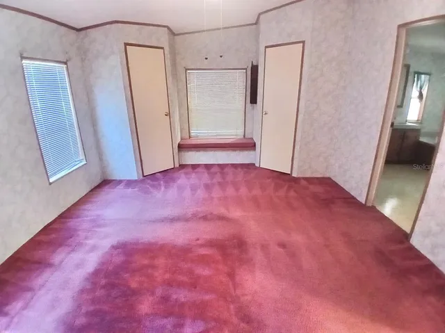 a view of a room with an empty space