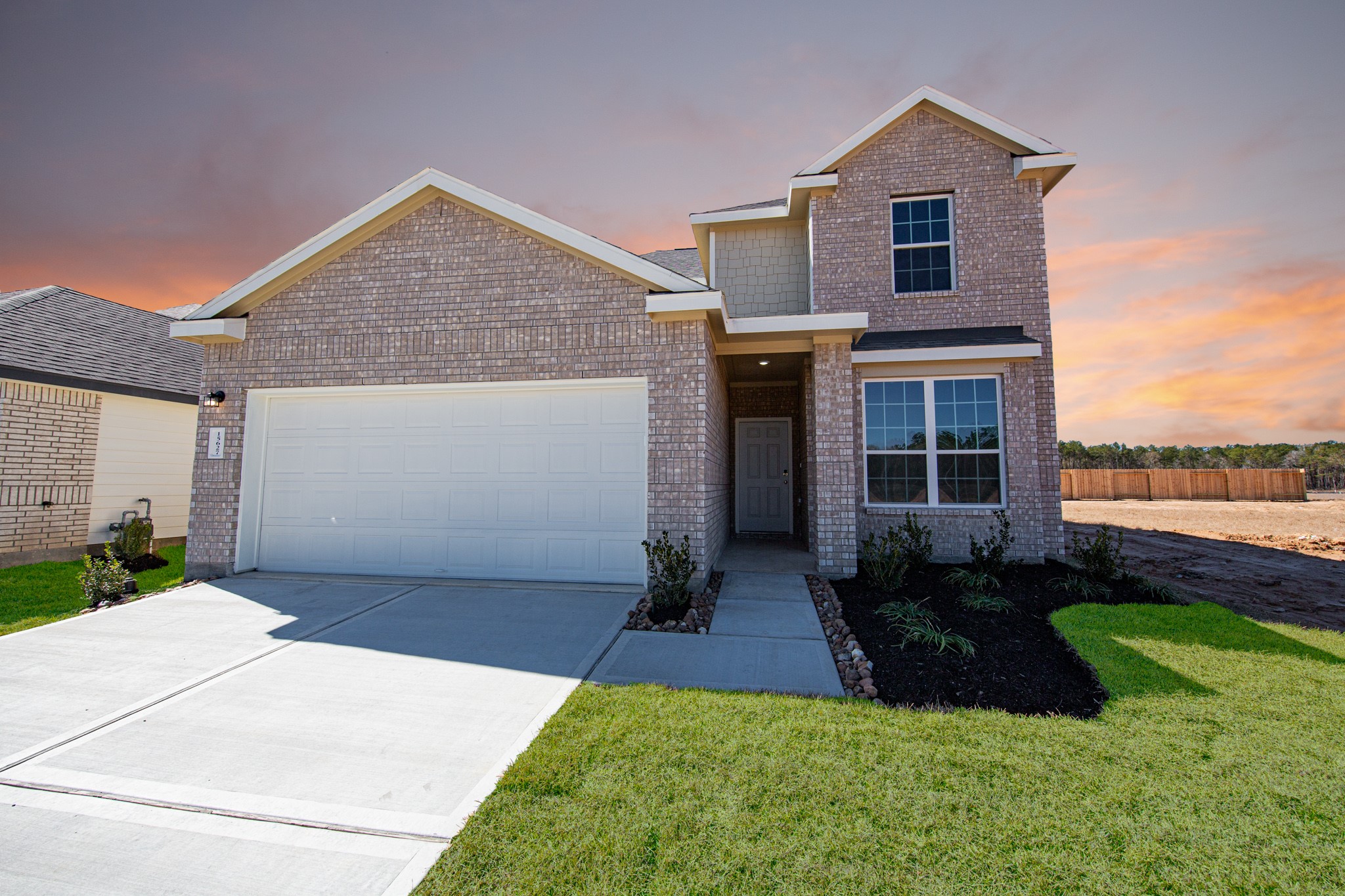 15627 Tranquil Pines Street Conroe, TX 77302 - Photo 1 of 27 a front view of a house with yard