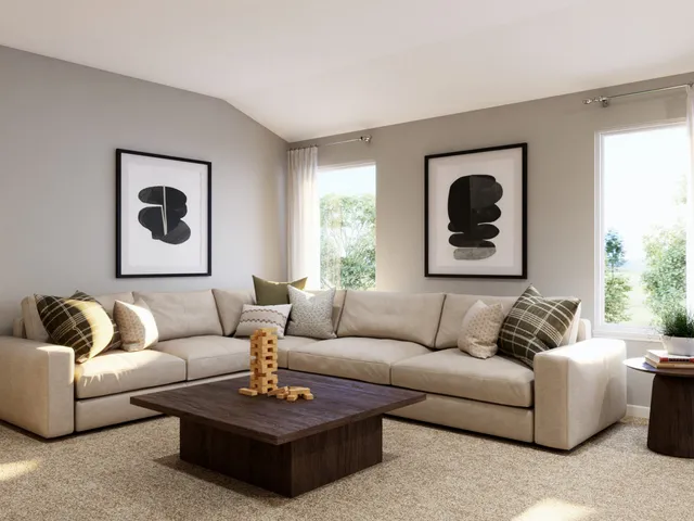 a bedroom with a bed and a table in it