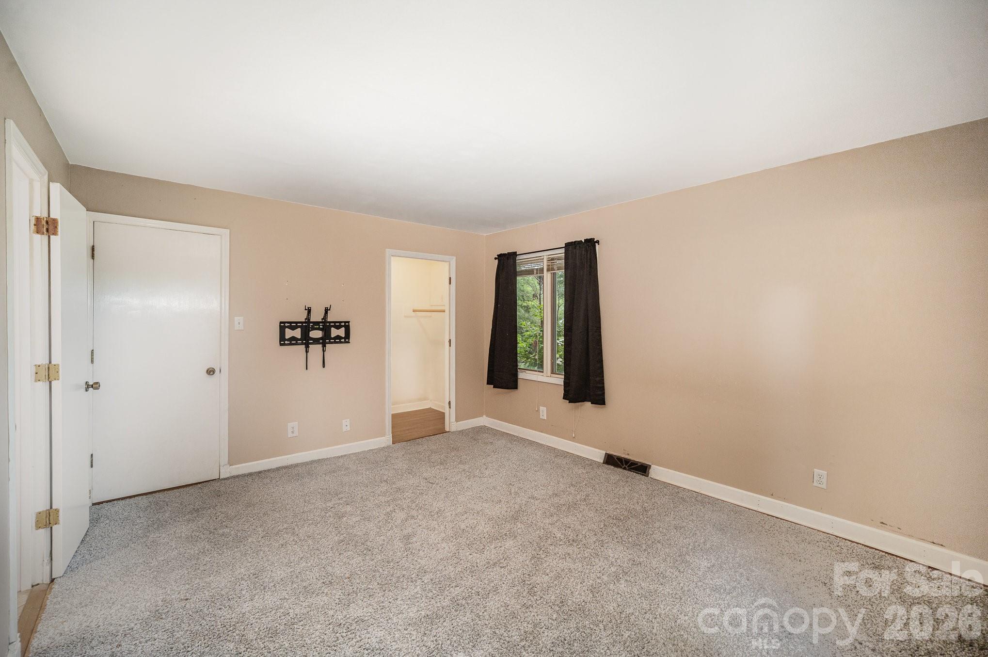 110 Hidden Valley Cherryville, NC 28021 - Photo 13 of 23 an empty room with windows