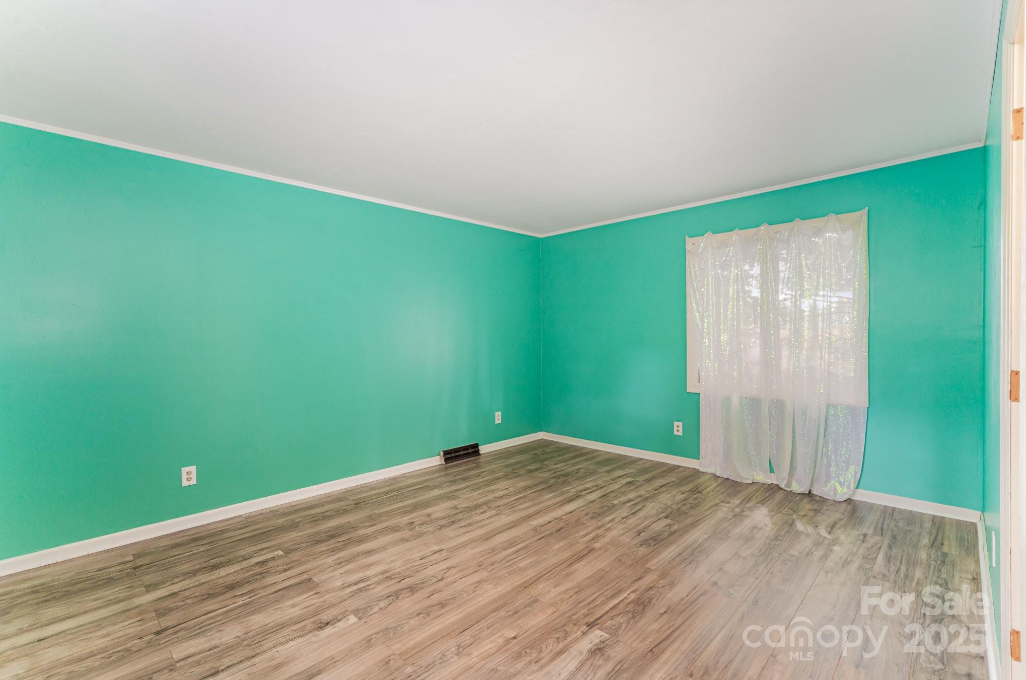110 Hidden Valley Cherryville, NC 28021 - Photo 14 of 23 a view of a big room with wooden floor