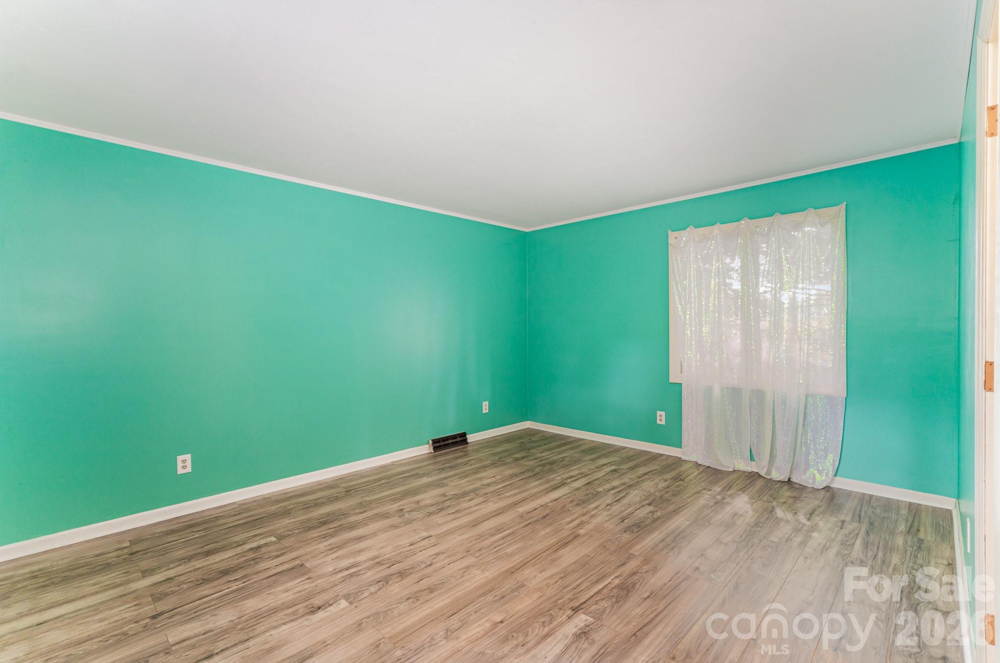 110 Hidden Valley Cherryville, NC 28021 - Photo 15 of 23 a view of a big room with wooden floor