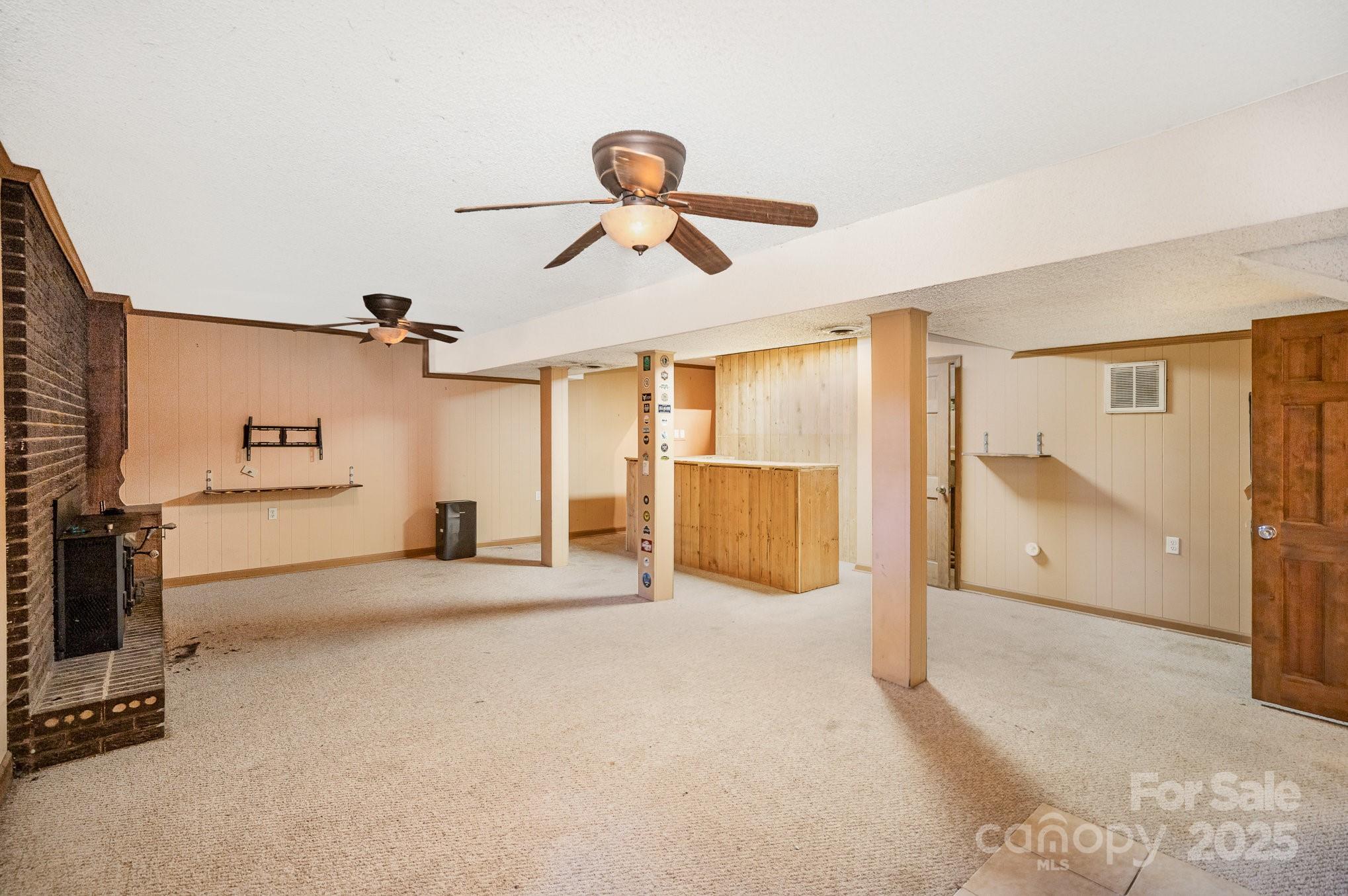 110 Hidden Valley Cherryville, NC 28021 - Photo 16 of 23 a view of a livingroom with a furniture and a ceiling fan