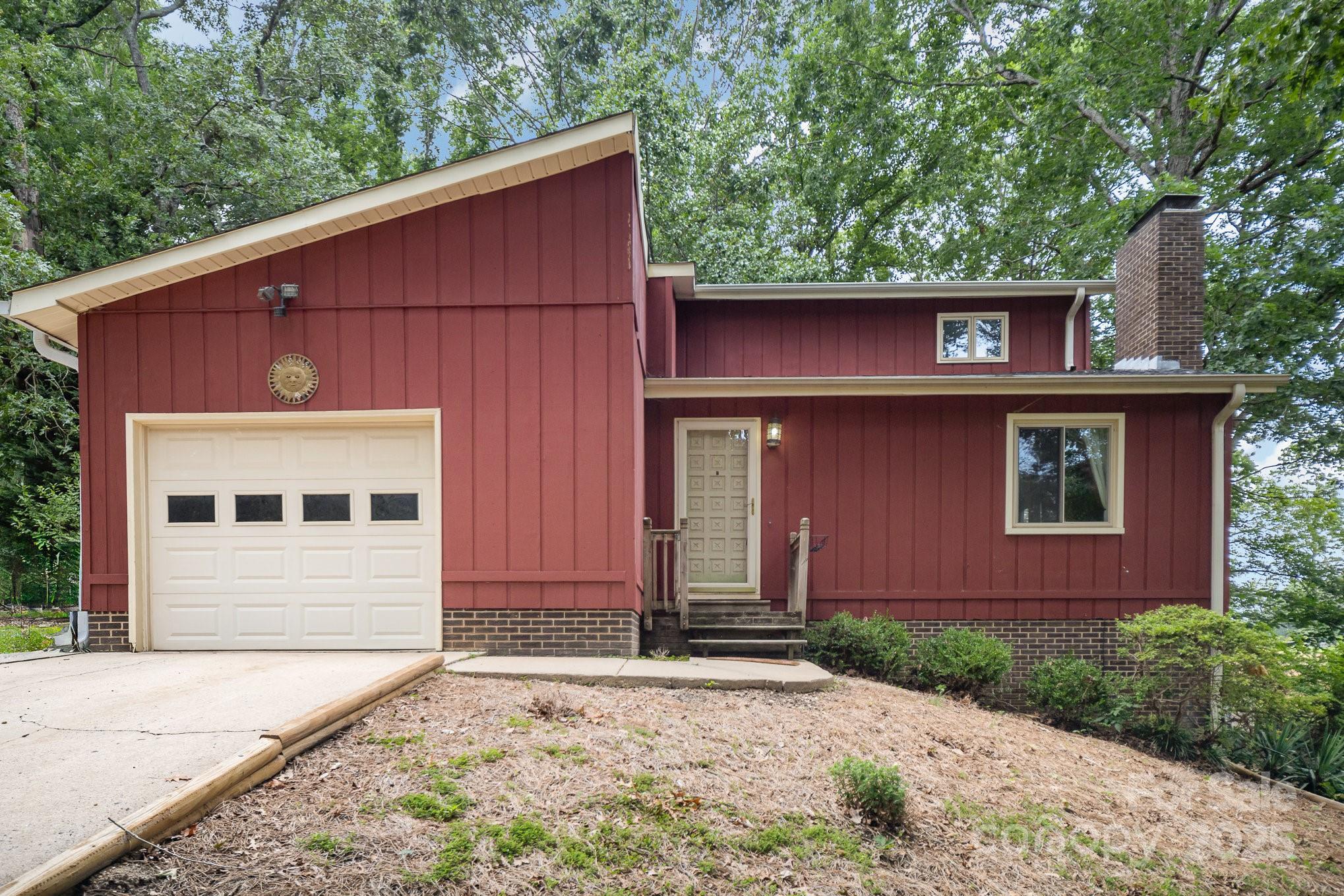 110 Hidden Valley Cherryville, NC 28021 - Photo 22 of 23 a front view of a house with a yard