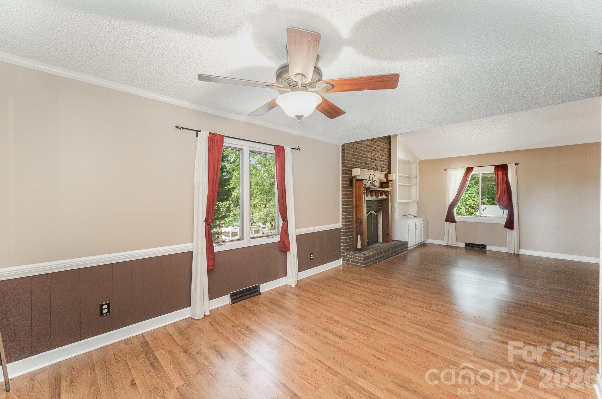 110 Hidden Valley Cherryville, NC 28021 - Photo 10 of 23 a view of empty room with wooden floor and fan