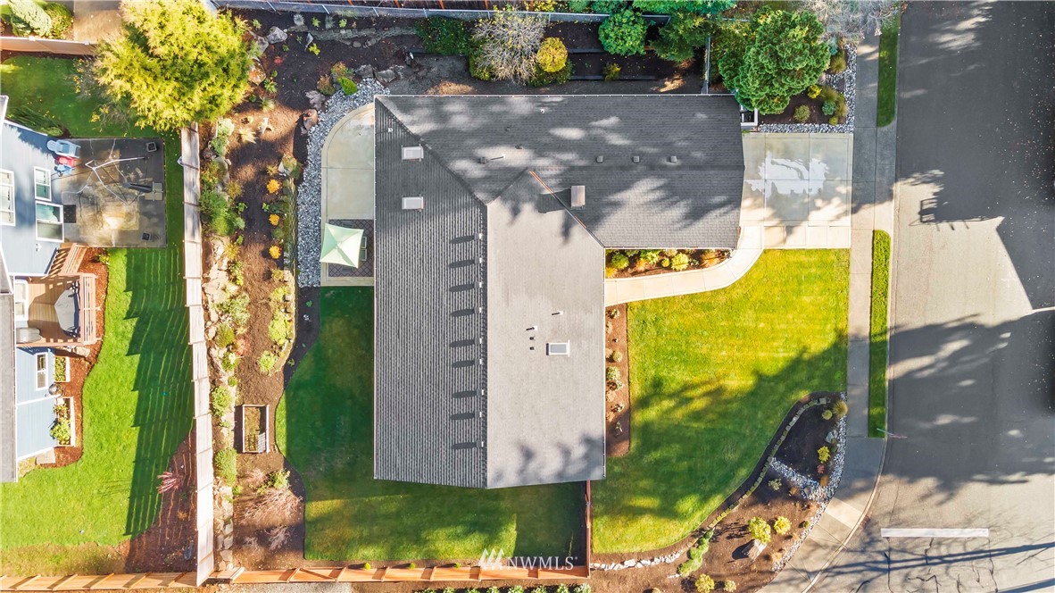 10404 Northeast 197th Street Bothell, WA 98011 - Photo 2 of 29 an aerial view of a residential houses with outdoor space