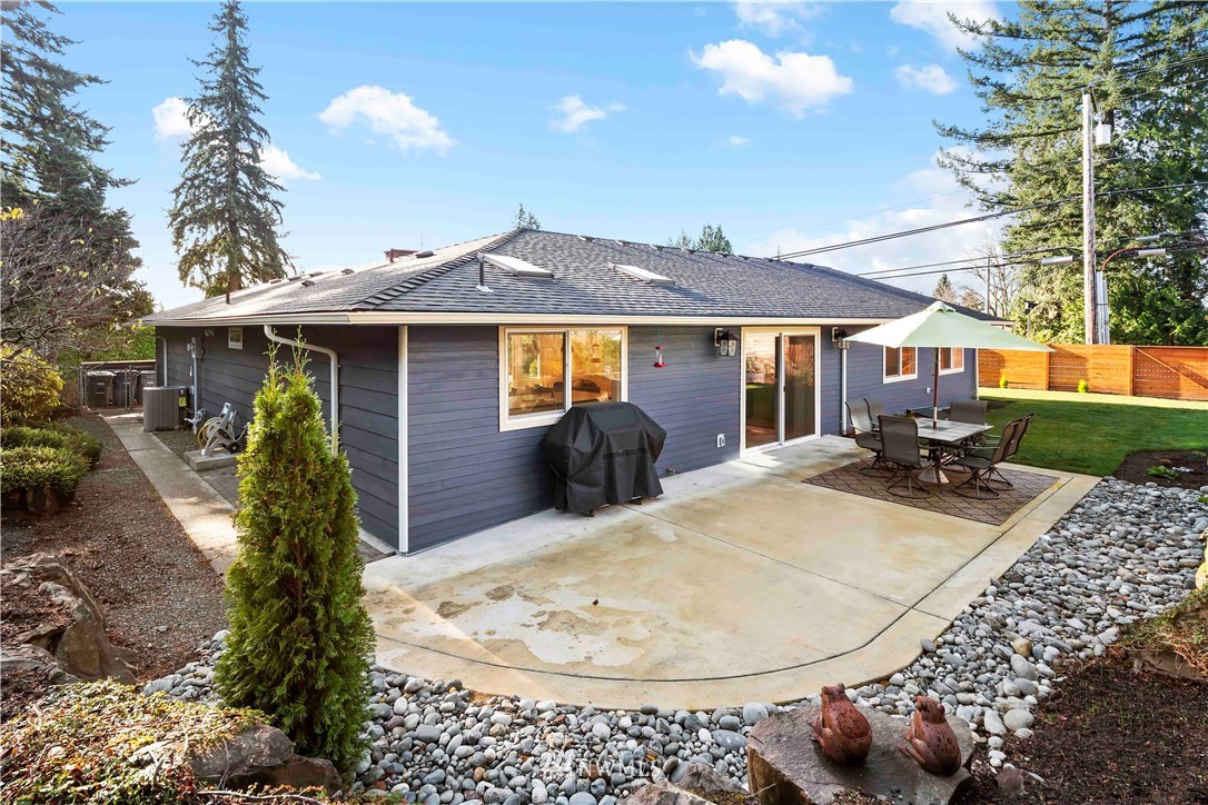 10404 Northeast 197th Street Bothell, WA 98011 - Photo 28 of 29 a view of a house with patio