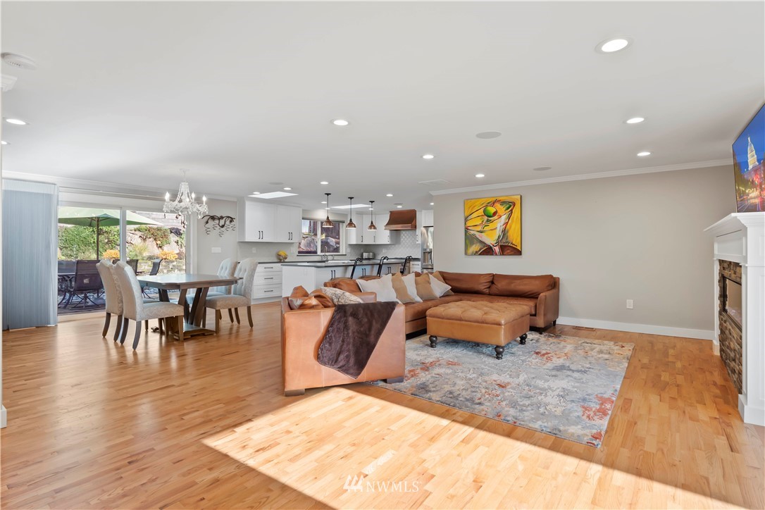 10404 Northeast 197th Street Bothell, WA 98011 - Photo 5 of 29 a living room with furniture and wooden floor