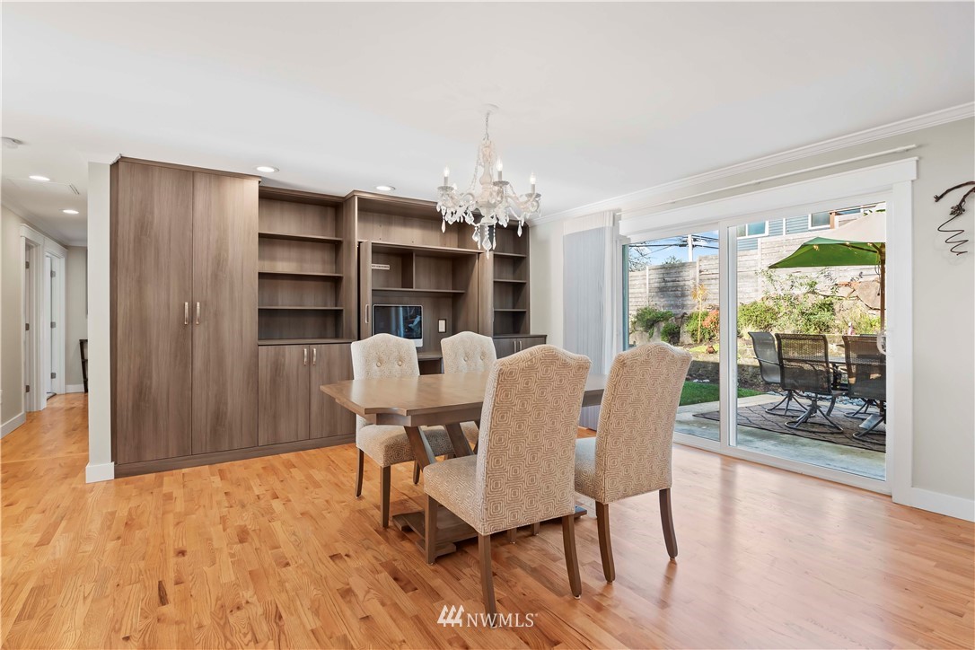 10404 Northeast 197th Street Bothell, WA 98011 - Photo 6 of 29 a dining room with furniture window and wooden floor