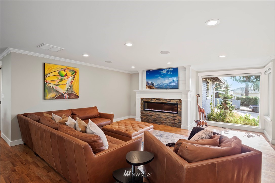 10404 Northeast 197th Street Bothell, WA 98011 - Photo 10 of 29 a living room with furniture fireplace and window