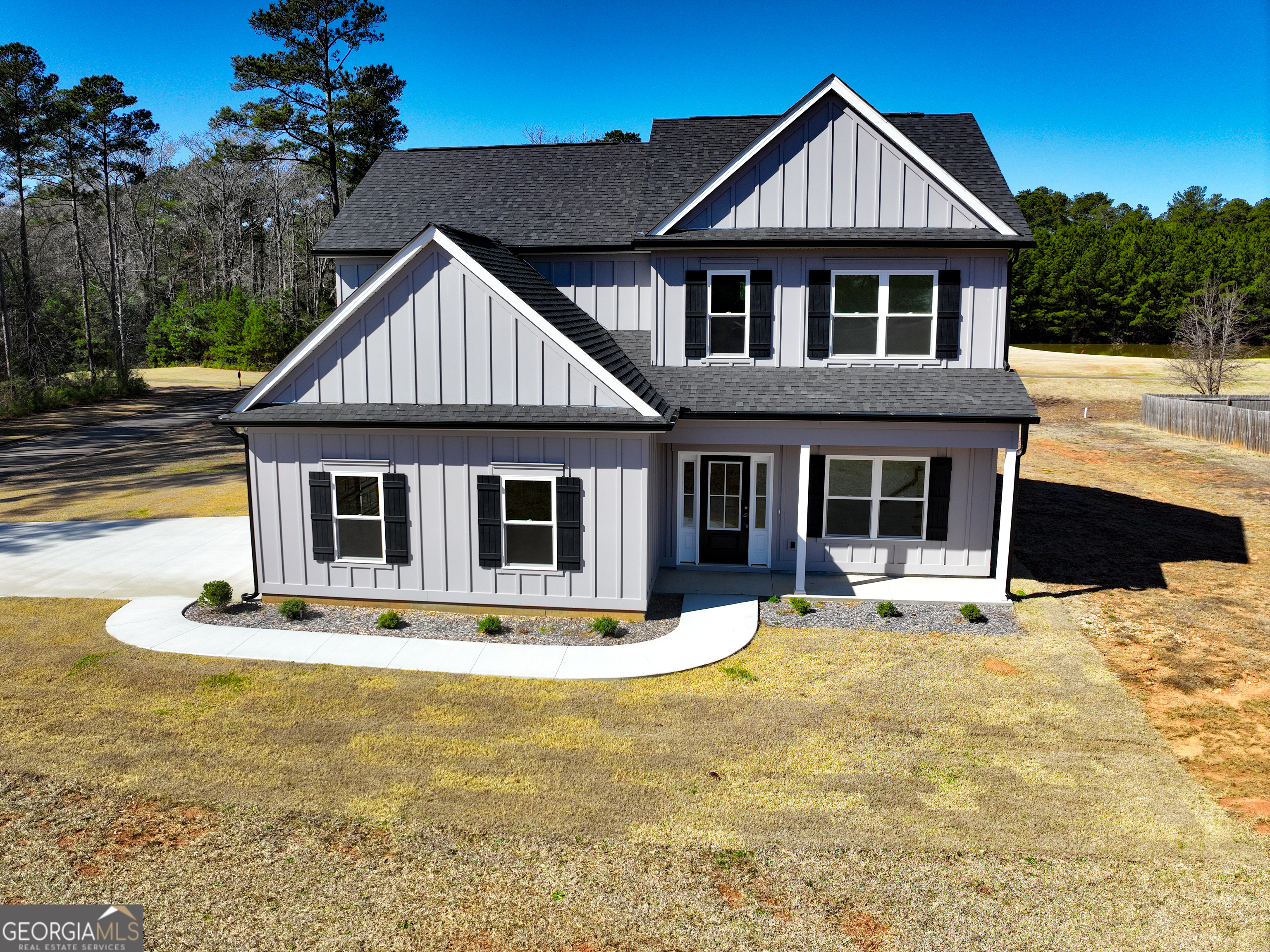 705 Riverside Estates Lanett, AL 36863 - Photo 1 of 29 a front view of a house with a yard