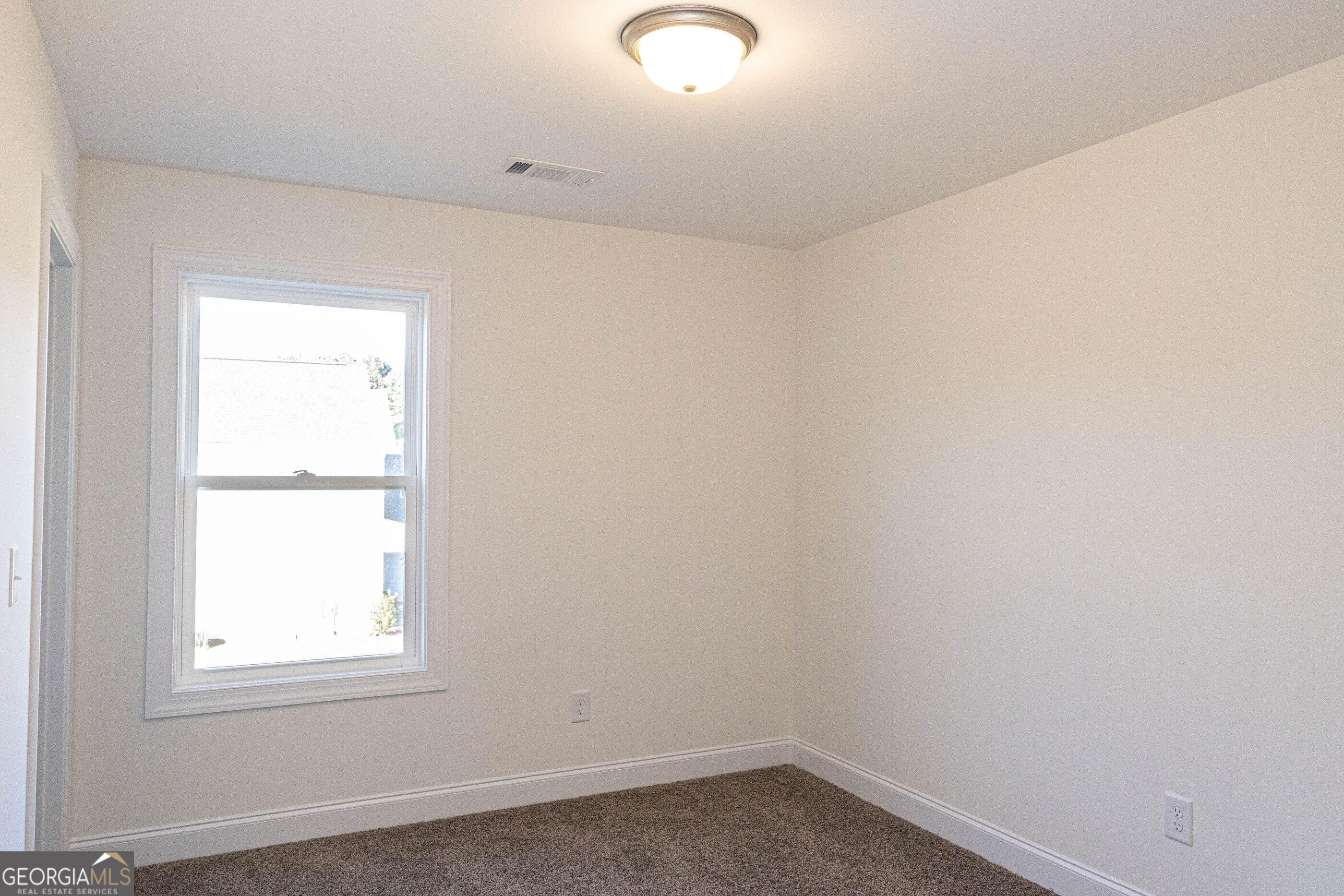 705 Riverside Estates Lanett, AL 36863 - Photo 20 of 29 an empty room with a window