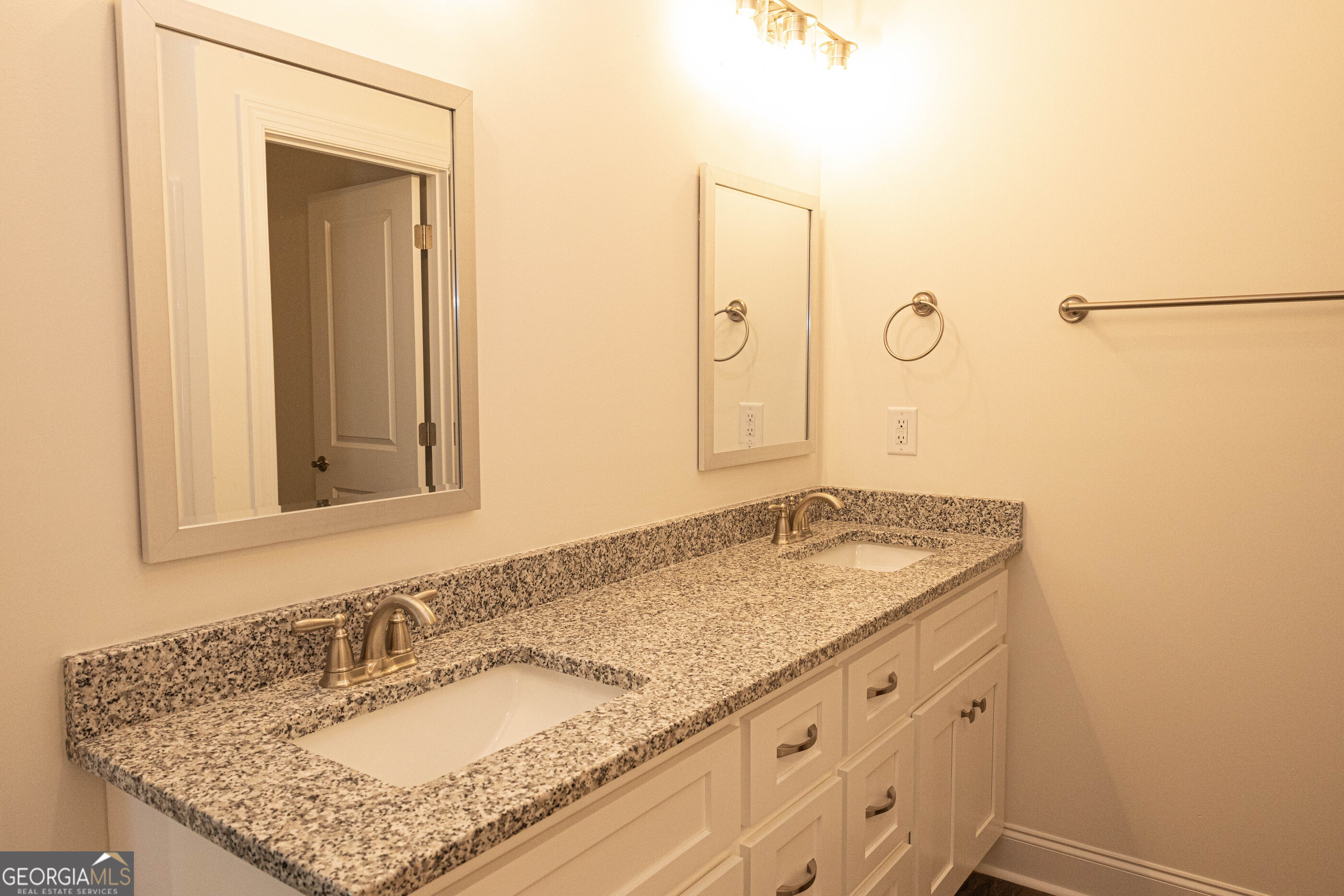 705 Riverside Estates Lanett, AL 36863 - Photo 22 of 29 a bathroom with a granite countertop sink and a mirror