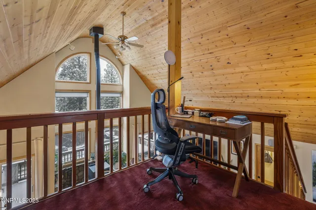 a view of a balcony with furniture