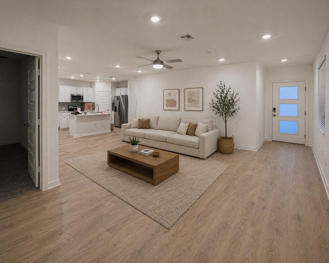 2313 Ranier Court Austin, TX 78754 - Photo 2 of 5 Open-concept living area featuring wood-finish flooring, recessed lighting, and a modern ceiling fan