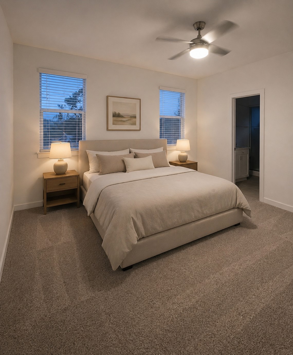2313 Ranier Court Austin, TX 78754 - Photo 4 of 5 Carpeted bedroom featuring two windows with blinds, a ceiling fan with integrated lighting, and a doorway leading to an adjoining space