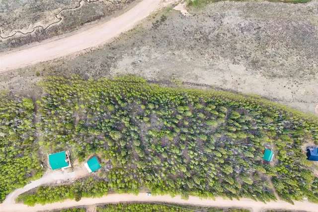 a street sign that is on a sidewalk