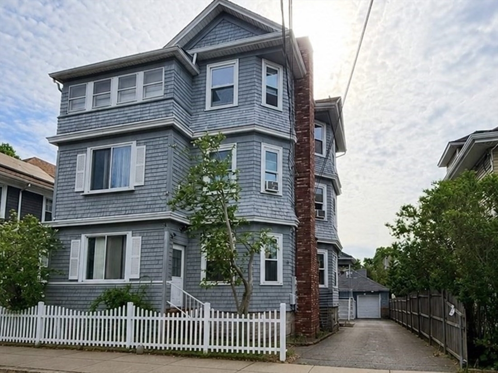 37 Shawmut Street Fall River, MA 02720 - Photo 1 of 16 a front view of house with yard