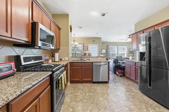 a view of a backyard with plants