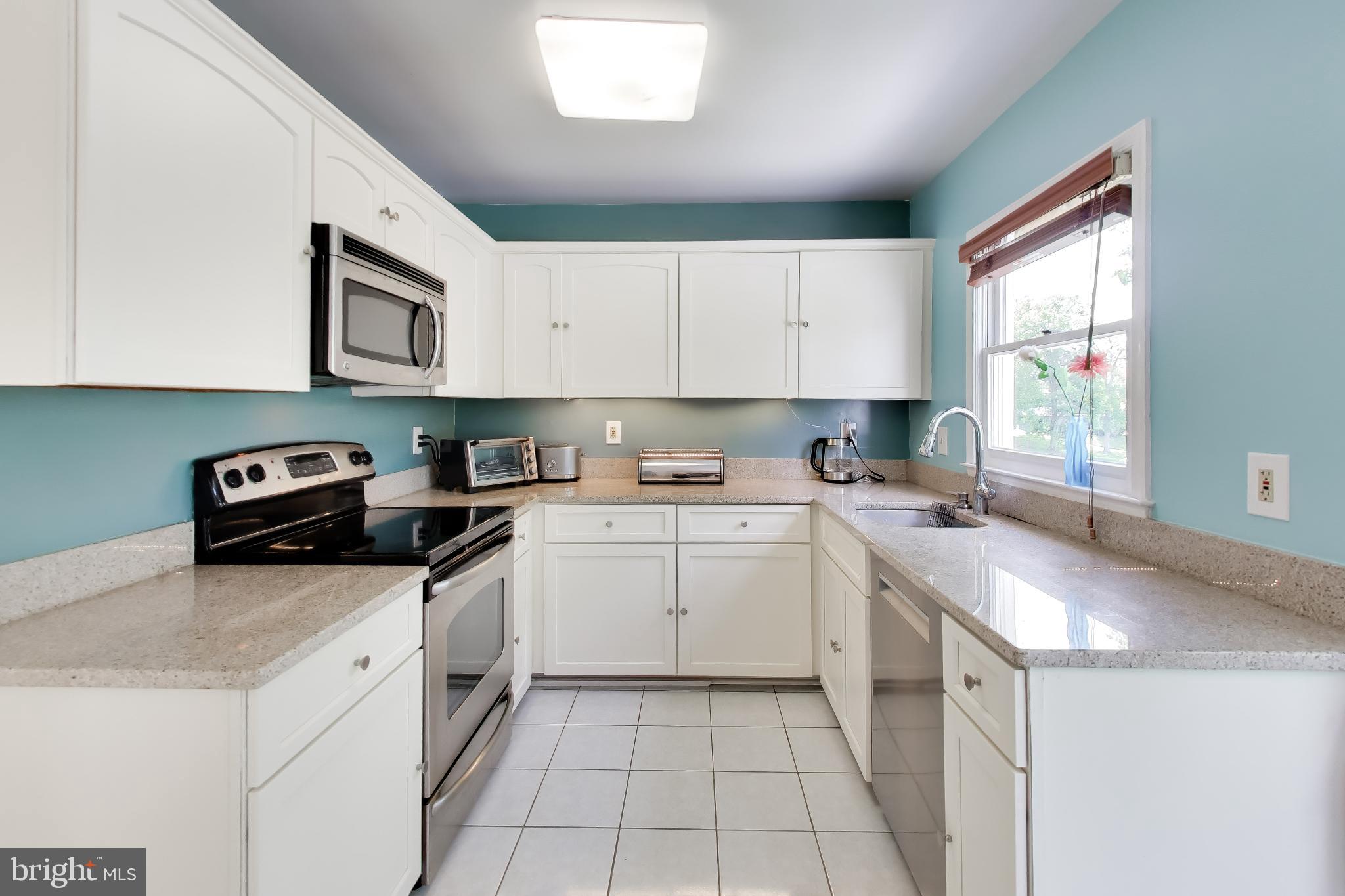 2421 Pondside Terrace Silver Spring, MD 20906 - Photo 6 of 44 Sunny, efficient kitchen