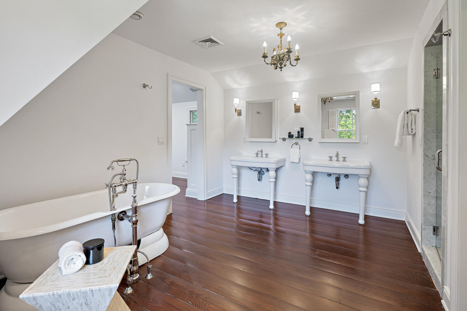 1446 Ponus Ridge Road New Canaan, CT 06840 - Photo 12 of 25 a living room with furniture and a chandelier