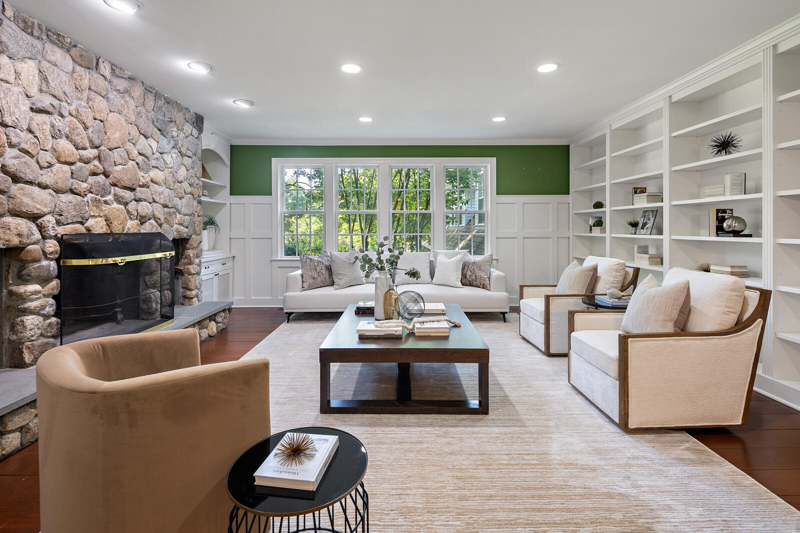 1446 Ponus Ridge Road New Canaan, CT 06840 - Photo 6 of 25 a living room with furniture and a fireplace