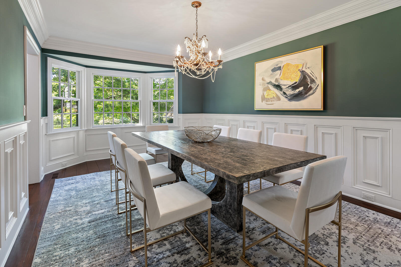 1446 Ponus Ridge Road New Canaan, CT 06840 - Photo 7 of 25 a view of a dining room with furniture a rug and wooden floor